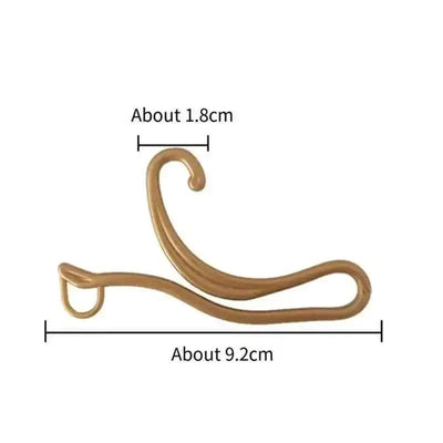 3 brown socks with plastic large hanging hooks, female socks with dragon hooks, male socks with large curved hooks, geometric irregular hanging hooks, sock hooks