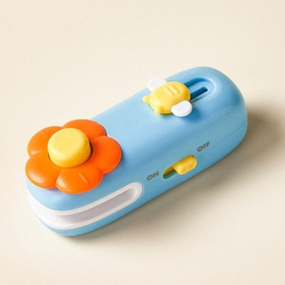 Flower Mini Magnetic Sealer, Handheld Rechargeable 2-in-1 Bag Sealing & Cutter Machine for Snack Packaging—Blue
