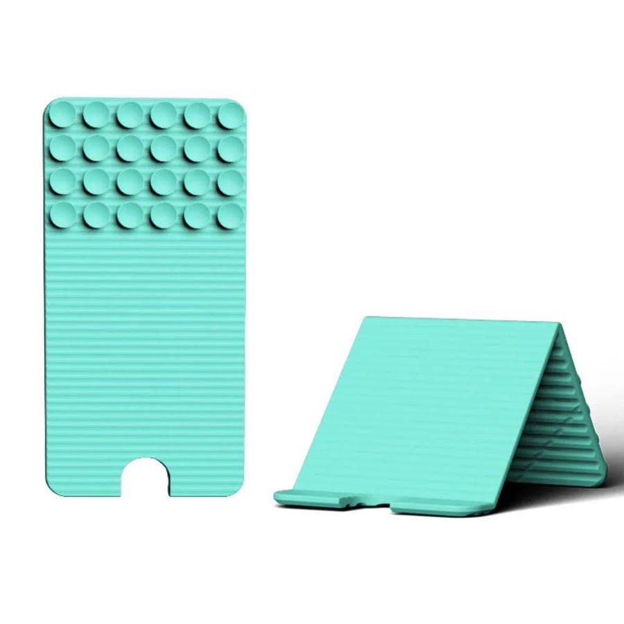 Versatile Foldable Silicone Suction Stand – Universal Adhesive Grip Pad for Phone, Tablet, and Laptop, Bendable Multi-Surface Mount for Desk, Mirror, Gym, and Travel (Mint)