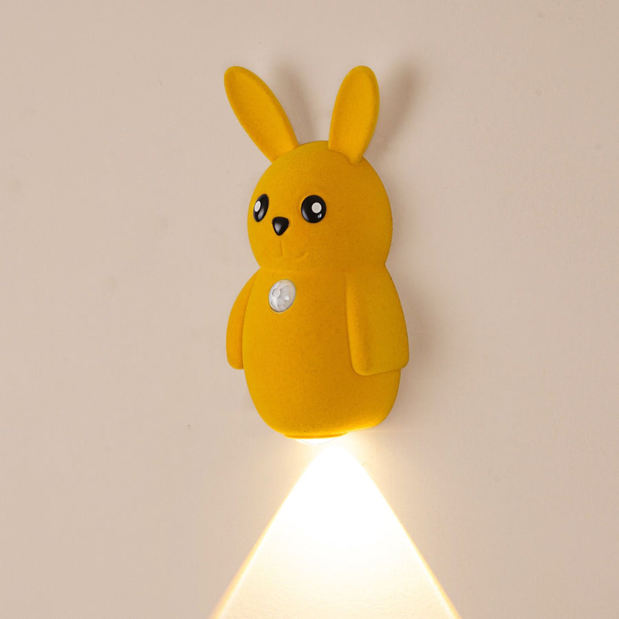 Adorable bunny-shaped motion sensor wall light with magnetic mounting, flicker-free LED, and three color temperatures—perfect for bedrooms, hallways, and staircases to create a warm, hands-free glow at night. (Yellow, 1PCS)