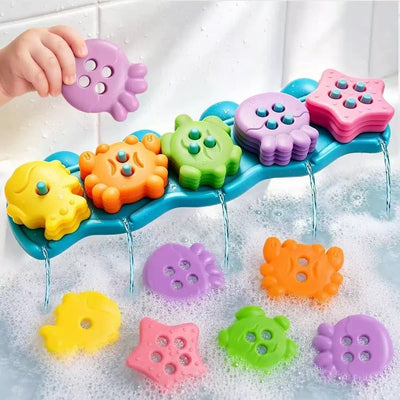 Turn bath time into an ocean adventure with this colorful silicone stacking toy set, featuring a suction cup wave base and five sea creature friends that little hands can grab, sort, and nest for endless splashing fun at home or on the go. (Blue)
